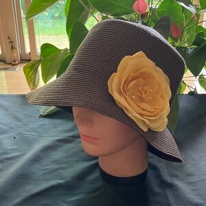 Elegant Brown Hat with Yellow Flower Accent